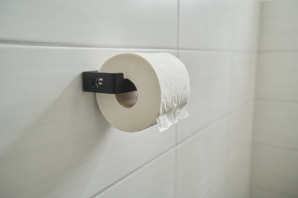 Kernform Tide - Toilettenpapierhalter aus Aluminium