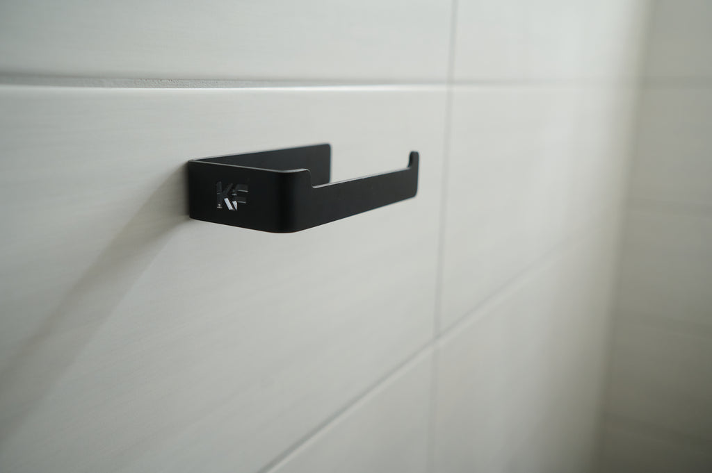 Kernform Tide - Toilettenpapierhalter aus Aluminium